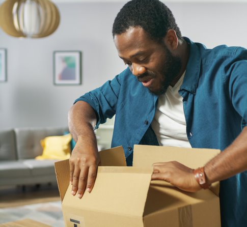 Man opening a box