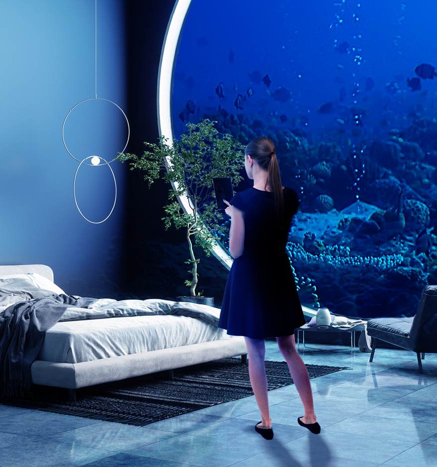 Exotic hotel under water, woman with smartphone